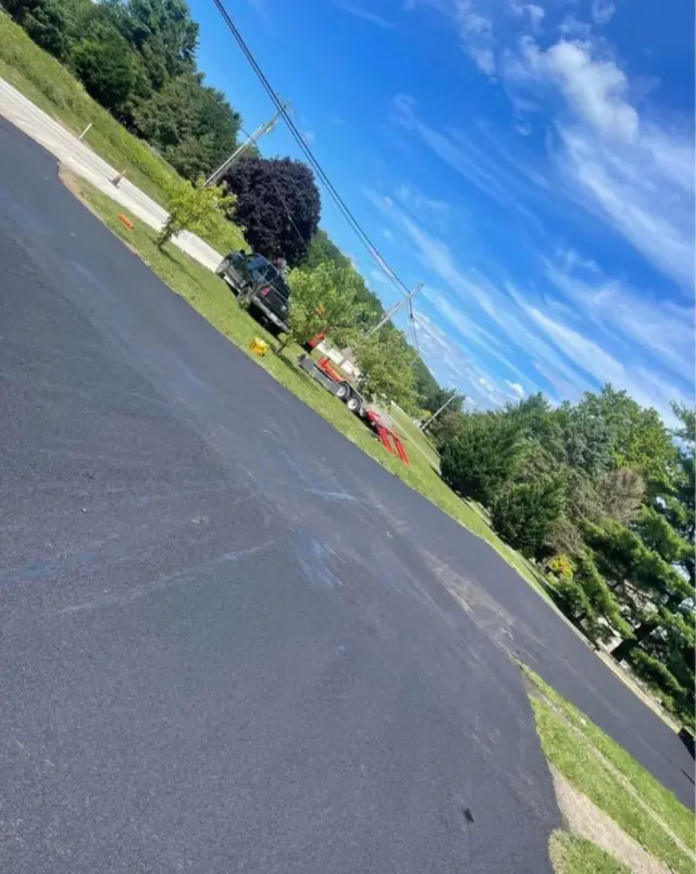 New driveway with landscaped border